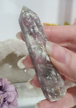 Load image into Gallery viewer, Pink Tourmaline in Quartz Crystal Point Tower Stone.

STONE OF SELF LOVE &amp; COMPASSION

Lovely Pink Tourmaline in Quartz point tower. Lovely pockets of Pink Tourmaline. 


