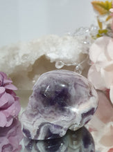 Load image into Gallery viewer, Skull Amethyst Chevron Crystal Carving Stone.

INSPIRES INTUITION &amp; SPIRITUALITY

Beautiful polished Amethyst Chevron Skull Crystal Carving Stone. 


