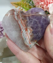 Load image into Gallery viewer, Amethyst Agate Heart Crystal Carving Stone on plastic Stand

Inspires intuition and Emotional Well Being

Beautiful Polished Amethyst Agate Heart Crystal Carving on plastic stand. Has natural formations.
