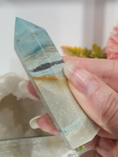 Load image into Gallery viewer, Trolleite Crystal Point Tower Stone.  

INSPIRES MANIFESTATION AND SPIRITUAL GUIDANCE

Lovely Trolleite point tower.  
