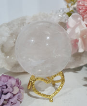 Load image into Gallery viewer, Quartz Sphere Crystal Carving Stone on Silver Stand

Inspires Magick, Purity &amp; Spirituality

Stunning Quartz Crystal Sphere Carving Stone on silver stand.  A must for any crystal collector
