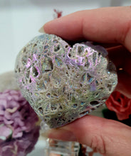 Load image into Gallery viewer, Gorgeous Titanium Aura Sphalerite Heart Crystal Carving Stone on plastic Stand. Aids in psychic energy, Uplifts and balances
