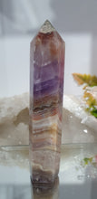 Load image into Gallery viewer, Lovely Amethyst Agate Tower. stunning tower just has a slight lean and the tip has paint or something on it. doesnt look like stone.  think it might have paint on or part of the tip protection. apart from this the colouring is gorgeous. 
