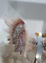 Load image into Gallery viewer, Amethyst Agate Angel Wings on stand.

Inspires Intuition and connection to the divine

Angel Wings
Symbolise love, protection, purity and freedom. Connections to the Angels and divine realm.

Beautiful Amethyst Agate Angel wings on stand.   A must for any crystal collection!
