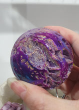 Load image into Gallery viewer, Pink Titanium Aura Sphalerite Sphere Crystal Carving on Silver Stand.

PROMOTES PSYCHIC DEVELOPMENT AND UPLIFTS

Absolutely Stunning Pink Titanium Aura Sphalerite Crystal Sphere on Silver Sand. The druzy on this in insane!. 
