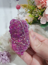 Load image into Gallery viewer, ENCHANTED AURA - Handcrafted Titanium Aura Quartz Crystal Energy Enhancer© / Hanger / Ornament / Suncatcher 

inspires EMPOWERMENT | COMPASSION | MAGICK

Gorgeous Titanium Aura Quartz crystal beaded with Rhodochrosite, Amethyst and Rose Quartz. Wire wrapped in silver

Genuine Crystals. no plastic or glass. Ensuring energy flow throughout the enhancer. Crystal Suncatchers
