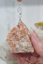 Load image into Gallery viewer, EMPOWERED BY THE SUN" Handcrafted Sunstone Raw Crystal Carving Silver Crystal Energy Enhancer© Hanger Ornament Suncatcher 

Inspires EMPOWERMENT | JOY | COURAGE

Lovely Sunstone rough crystal stone beaded with Sunstone and Quartz.  Wire wrapped in silver
