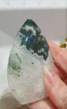 Load image into Gallery viewer, Moss Agate Flame Tower Crystal Carving Stone. Discounted because she is a tad wobbly BUT she has the most glorious Stalactite!

INSPIRES GROUNDING AND CONNECTION TO EARTH

Lovely Moss Agate Flame Crystal Carving Stone.  Wobby with a gorgeous stata
