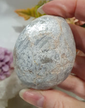 Load image into Gallery viewer, Celestite Egg Crystal Carving on silver Stand.

Inspires Communication with the Angels

Gorgeous Celestite egg Crystal Carving on silver Stand.
