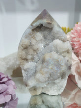 Load image into Gallery viewer, Titanium Aura Sphalerite Flame Tower Druzy Crystal Cluster

PROMOTES PSYCHIC DEVELOPMENT AND UPLIFTS

Absolutely Stunning Titanium Aura Sphalerite Crystal Flame Crystal Cluster.  The Druzy and formation on this is spectacular!. 
