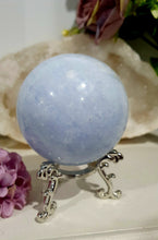 Load image into Gallery viewer, Celestite Sphere Crystal Carving on Silver Stand. Inspires Communication with the Angels
