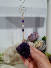 Load image into Gallery viewer, THE SEER AMULET - handcrafted Amethyst Cluster gold Crystal Energy Enhancer© Hanger Ornament Suncatcher Perfect gift for any crystal lover. Suncatchers Australia

