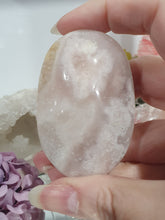 Load image into Gallery viewer, Pink Amethyst / Flower Agate Crystal Palm Stone palmstone on stand.

Inspires ENCOURAGEMENT &amp; SELF DISCOVERY

Pink Amethyst / Flower Agate Crystal Palm stone on plastic stand. So lovely.  
