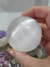 Load image into Gallery viewer, Selenite Sphere Crystal Carving on Silver Stand.| Inspires Connection to the Angelic Realm
