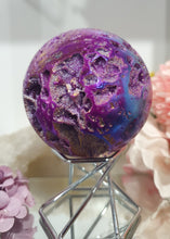 Load image into Gallery viewer, Pink Titanium Aura Sphalerite Sphere Crystal Carving on Silver Stand.

PROMOTES PSYCHIC DEVELOPMENT AND UPLIFTS

Absolutely Stunning Pink Titanium Aura Sphalerite Crystal Sphere on Silver Sand. The druzy on this in insane!. 
