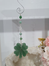 Load image into Gallery viewer, LUCKY FOUR-LEAF CLOVER BLESSINGS" Handcrafted Aventurine Crystal Carving Silver Stone Crystal Energy Enhancer© / Hanger / Ornament / Suncatcher 

Promotes GOOD FORTUNE | HOPE | MAGIC | PROTECTION

A four-leaf clover Symbolises good luck and abundance. It is believed if you hold a four-leaf clover you will gain the ability to see fairies and leprechauns and find their treasures. 

Beautiful Aventurine four-leaf clover crystal carving beaded with Amazonite, Aventurine and Quartz. Wire wrapped in Silver. 


