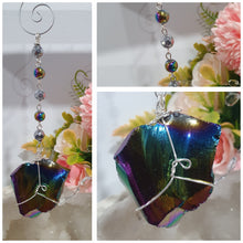 Load image into Gallery viewer, COSMIC ARMOUR - Handcrafted Rainbow Obsidian Stone Crystal Energy Enhancer© / Hanger / Ornament / Suncatcher 

INSPIRES PROTECTION AND GROUNDING

Gorgeous Rainbow Obsidian raw crystal stone beaded with Rainbow Hematite and Hematite. Wire wrapped in silver
