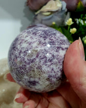 Load image into Gallery viewer, Unicorn Stone Sphere Crystal Carving on Gold Stand. Inspires Calmness, Empathy and Joy. 
Unicorn Stone consists of Pink Tourmaline, Lepidolite &amp; Smokey Quartz
