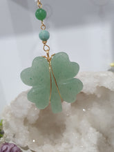Load image into Gallery viewer, "FOUR-LEAF CLOVER BLESSINGS" Aventurine Crystal Carving Gold Stone Crystal Energy Enhancer© / Hanger / Ornament / Suncatcher

GOOD FORTUNE | HOPE | MAGIC | PROTECTION

A four-leaf clover Symbolises good luck and abundance. It is believed if you hold a four-leaf clover you will gain the ability to see fairies and leprechauns and find their treasures.&nbsp;

Beautiful Aventurine four-leaf clover crystal carving beaded with Amazonite, Aventurine and Quartz. Wire wrapped in Gold
