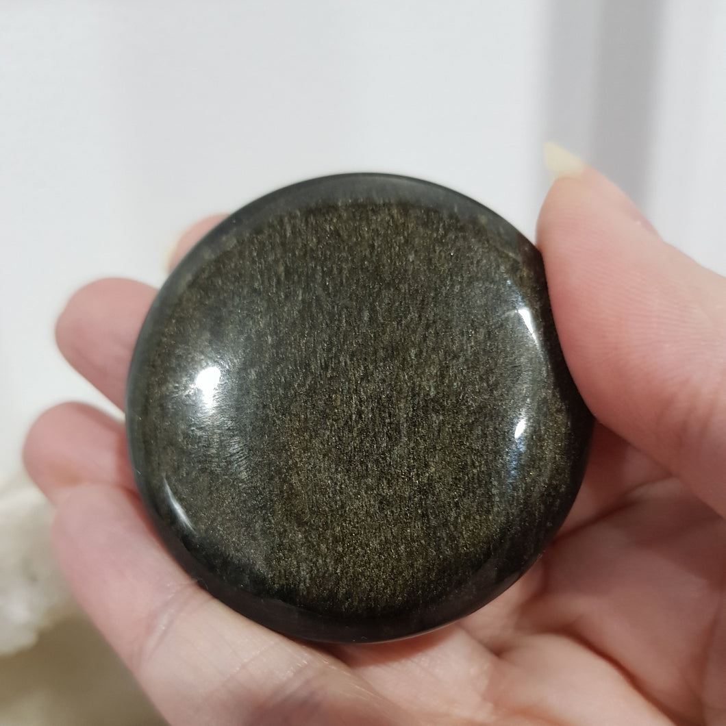 golden obsidian crystal palm stone