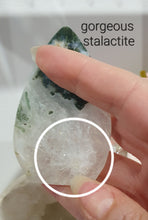 Load image into Gallery viewer, Moss Agate Flame Tower Crystal Carving Stone. Discounted because she is a tad wobbly BUT she has the most glorious Stalactite!

INSPIRES GROUNDING AND CONNECTION TO EARTH

Lovely Moss Agate Flame Crystal Carving Stone.  Wobby with a gorgeous stata
