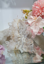 Load image into Gallery viewer, Fairy Quartz Cluster Crystal Carving Stone . Discounted as she is slightly bent 

Inspires Magick, Purity &amp; Spirituality

Stunning Quartz Crystal cluster fairy with gorgeous quartz crystal teeth. She is discounted as slightly bent at top
