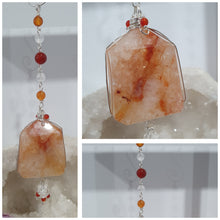 Load image into Gallery viewer, THE FIRE WITHIN" Handcrafted Fire Quartz Tower Crystal Carving Silver Crystal Energy Enhancer© Gemstone / Hanger / Suncatcher / Ornament 

STRENGTH | POWER | SPIRITUALITY

Beautiful Fire Quartz Tower Carving Crystal Energy Enhancer© / Sun Catcher / Ornament / Hanger beaded with Fire Quartz, Carnelian and Quartz.  wired in Silver
