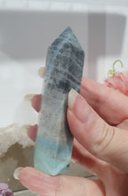 Load image into Gallery viewer, Trolleite Crystal Point Tower Stone.  

INSPIRES MANIFESTATION AND SPIRITUAL GUIDANCE

Lovely Trolleite point tower.  
