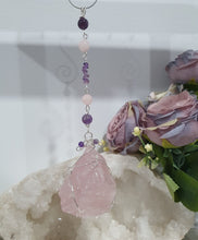 Load image into Gallery viewer, THE LOVE BOMB Rose Quartz Crystal Rough Silver Wired Crystal Energy Enhancer© Hanger Ornament Suncatcher. Inspires Unconditional Love, Harmony, Spirituality. Crystal Suncatchers
