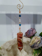 Load image into Gallery viewer, Beautiful Sunstone crystal tower beaded with apatite, sunstone and quartz suncatcher. inspires courage, joy and knowledge. Beautiful gift for any crystal lover. Hang in your room or space. 
